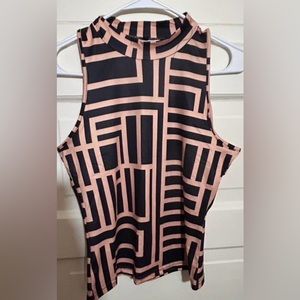 Woman’s tank top being and black